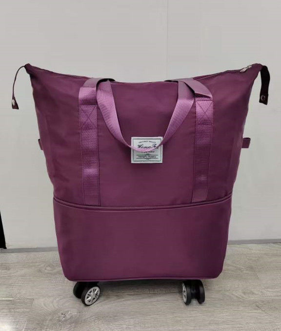 Bolso plegable con ruedas impermeable para hombro de uso al aire libre bolsos de viaje con monopatín bolso plegable de viaje