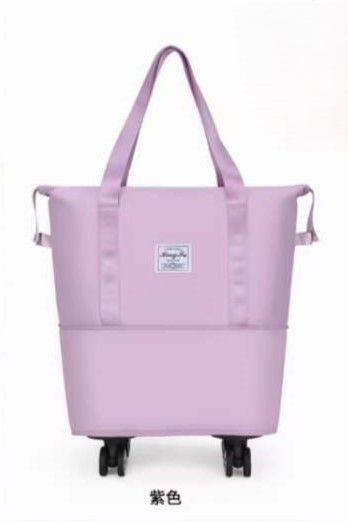 Nueva llegada exterior Logotipo personalizado de gran capacidad impermeable Fashion Weekend Duffel Bag con 4 ruedas