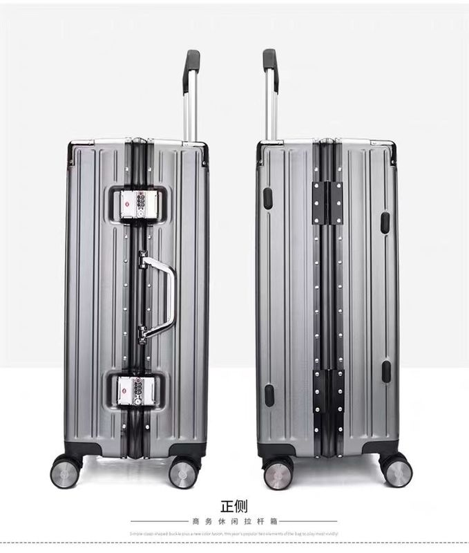 El equipaje de mano de marco de aluminio es silencioso y universal. Cuerpo de carretillas de ruedas en stock.