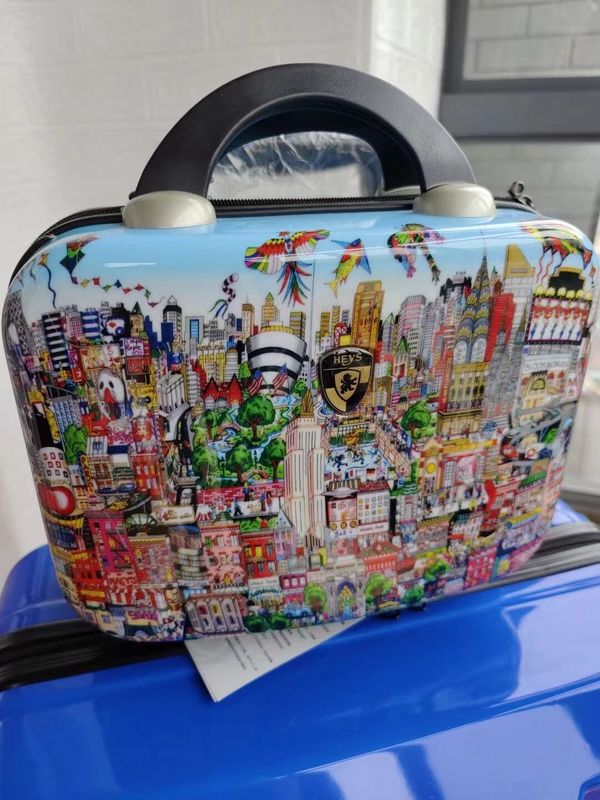 China de alta calidad fábrica colorido nuevo diseño cascarón duro inoxidable regalo conjunto Abs por mayor maleta cremallera tiempo de viaje