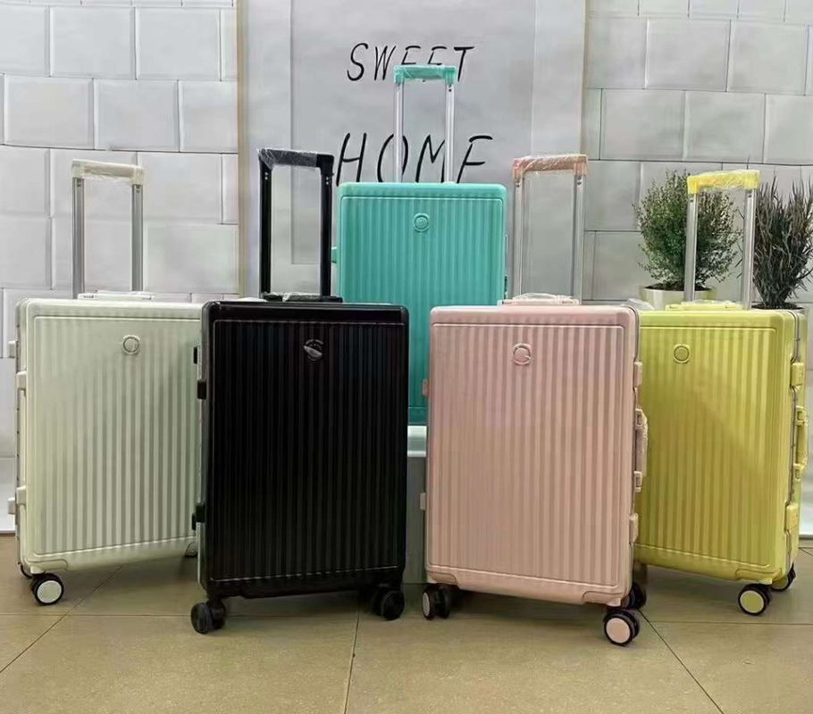 Tipo de cremallera multicolor ligero duradero con cáscara dura de 4 ruedas giratorias Tamaño de cabina Maleta de viaje