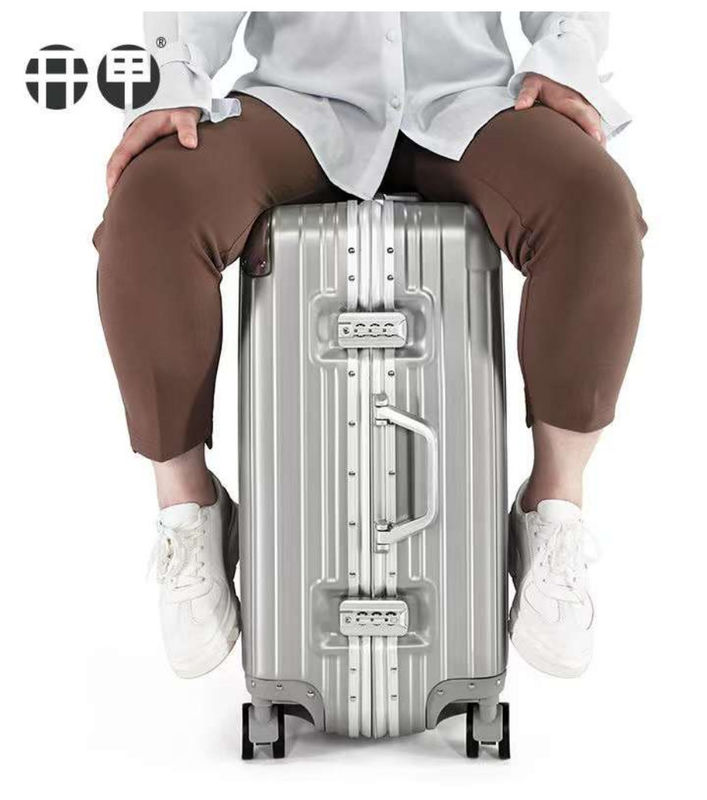 Carcasa dura 2024 equipaje duradero hecho de acero inoxidable barra de aluminio marco maleta de lujo carro de avión impermeable