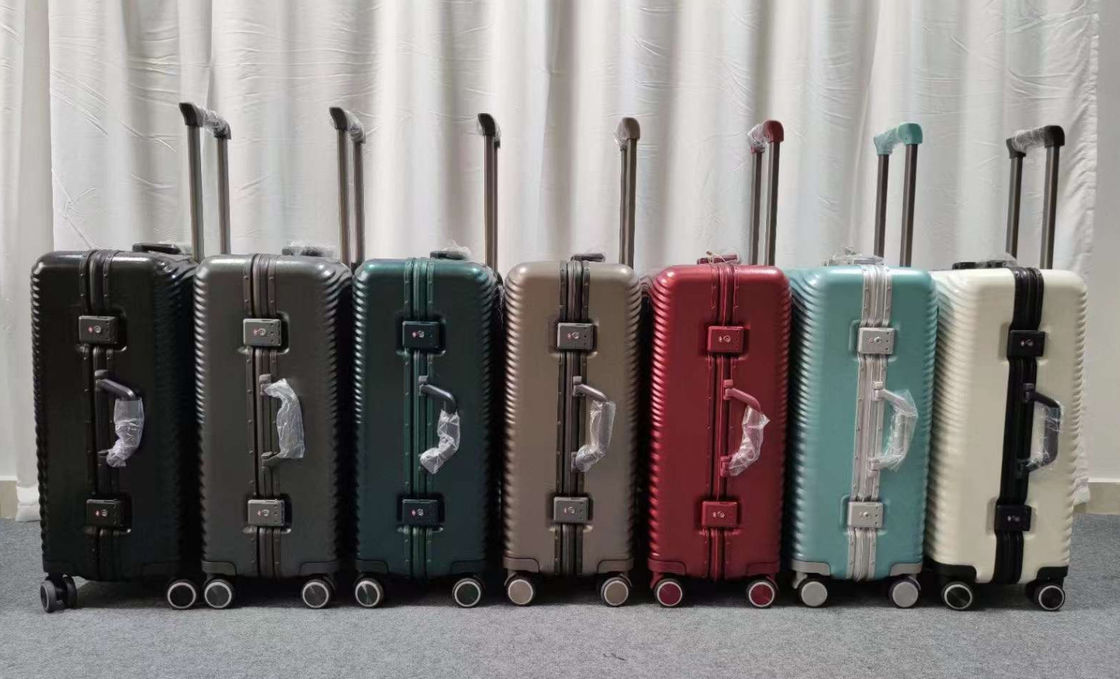 Color brillante ABS + PC mango de aluminio Precio de equipaje de alta calidad más reciente equipaje bolsas de carrito Venta caliente viaje de negocios equipaje